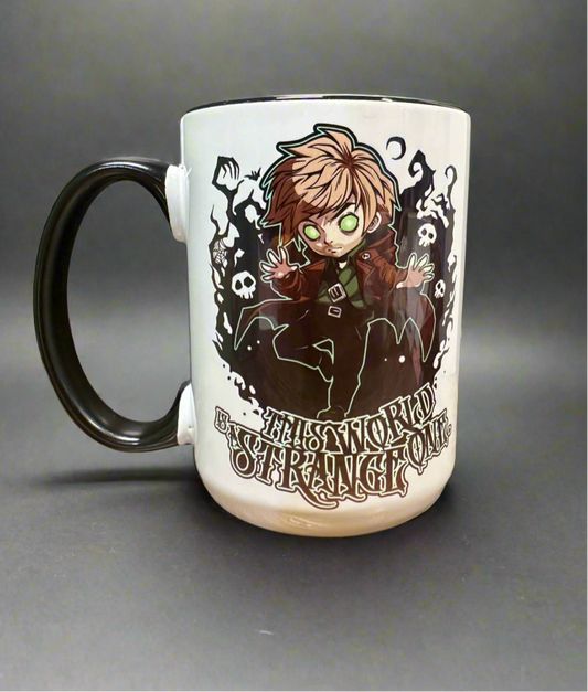 This World is a Strange One Mug